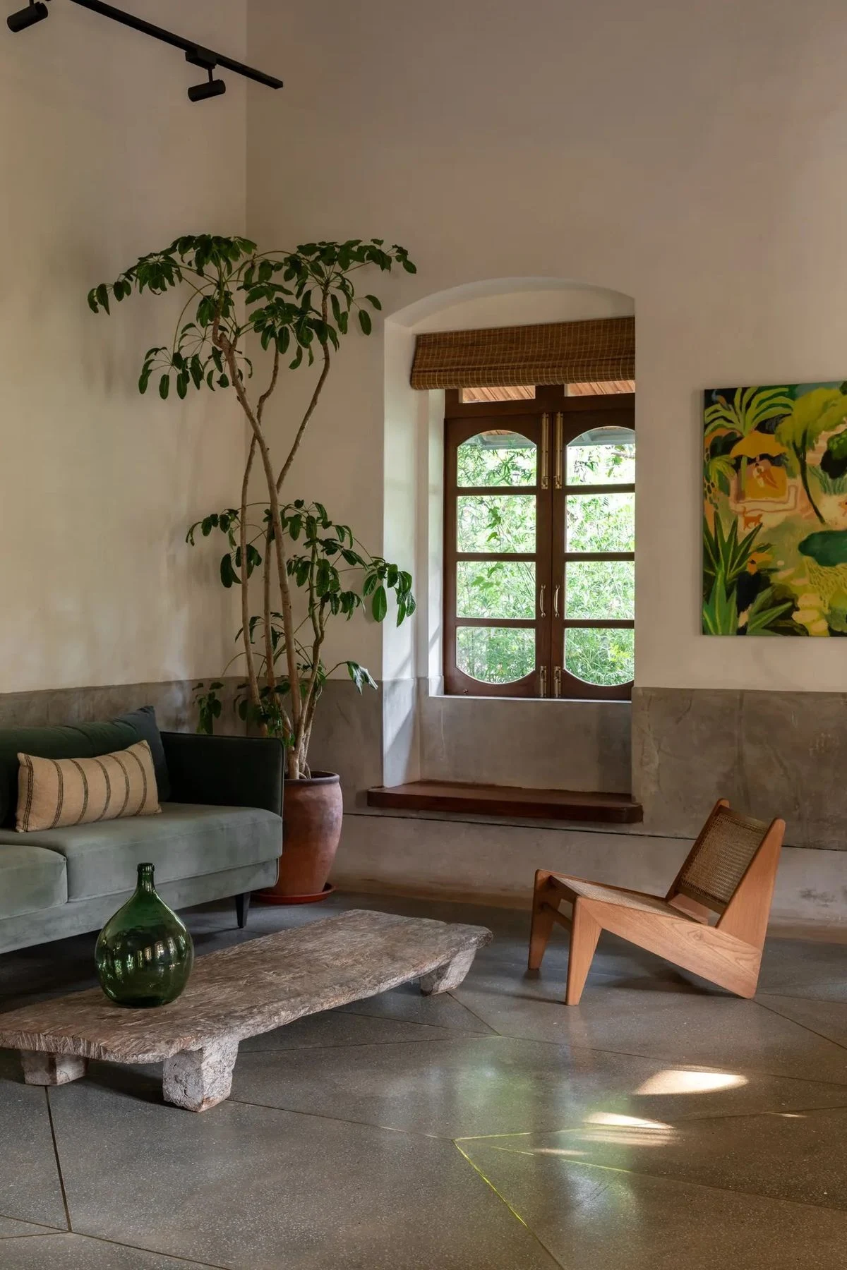 Light-filled interior with arched window
